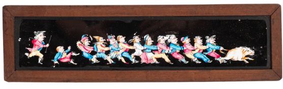 A collection of mahogany framed coloured magic lantern slides.