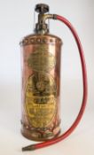 A Waterloo copper and brass fire extinguisher.