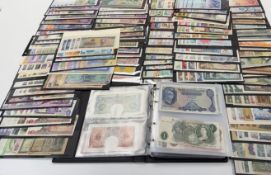 Collection of GB and world banknotes in album and on stockcards, Quantity with values to £5 etc.
