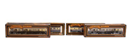 Four Mainline OO/HO GWR passenger coaches. In brown and cream livery, all boxed.