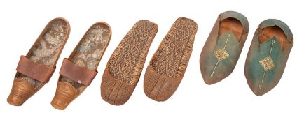 A pair of late 19th/early 20th century Moroccan babouche, gilt tooled green leather,