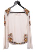 Matthew Williamson, A cream silk blouse with bell sleeves