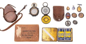 Two Vernier WWI era compasses in leather cases.