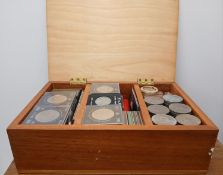 Modern Crowns including cased in wooden box, plus rolls of uncirculated 1/2p coins.