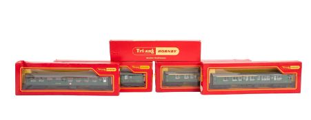 Five Triang-Hornby BR passenger coaches. All in BR green livery and boxed.