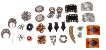 A mixed collection of shoe buckles. Mainly white metal examples including tortoiseshell etc.