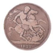 An 1822 and 1891 silver Crown coins.