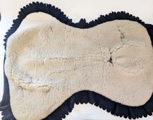 A Lifeguard's other ranks horse shabraque. Constructed of sheepskin with black lining.