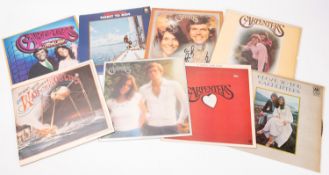 A group of fourteen LPs: six by the Carpenters together with albums by Stevie Wonder, The Shadows,