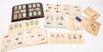 An accumulation of Wills, Players and other sets and part sets of cigarette cards,