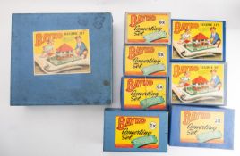 Eight Bayko building sets. Comprising nos.