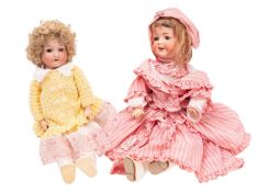 Two Armand Marseille Bisque head dolls, both with applied wigs over sleeping glass eyes,
