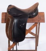 An Albion 18 inch Havana leather dressage saddle.