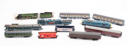 A mixed collection of OO gauge rolling stock.
