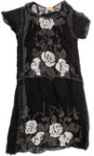 A 1930s beaded dress and slip.