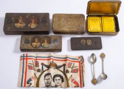 A WWI 1914 Christmas tin containing tobacco and cigarettes, one other 1914 Christmas tin,