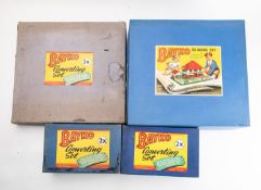 Four Bayko building sets. Including nos. 3X, 4, and two 2X, all boxed, unchecked for completeness.