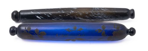 A Nailsea type glass rolling pin the dar