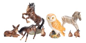 A Beswick Owl 1046 together with a colle