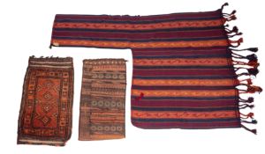 A Turkoman grain bag, the brick red fiel