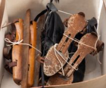 Two pairs of early 20th century ice skat