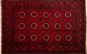 A Turkoman rug, the wine field with thre