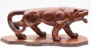 A carved and stained hardwood model of a