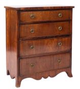 A mahogany chest of drawers in Regency style, late 19th century; of small proportions.