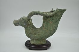 A Bronze Ox-head Wine Cup, Ryton.
Tang style.