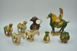A Group of Eight Sancai-glazed Animals and Vessels, Tang Style