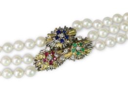 A Cultured Pearl Choker Necklace in the style of Charles de Temple,