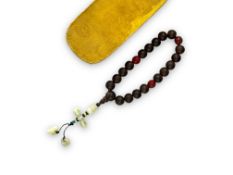 A Chinese Court Style Bracelet, in jade, aloeswood and lacquer, 19th/20th century, fitted box