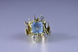 An Aquamarine and Six Baguette Diamond Ring, no marks but tested 18 carat gold, probably British 197