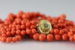 A Superb Three Row Graduated Red Coral Bead Necklace,