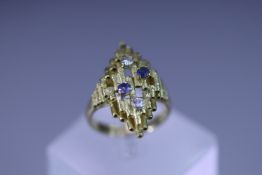A Charles de Temple 18 carat Gold Ring with two Sapphires and two Diamonds, signed c de t, hallmarke