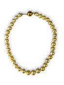 A Good Golden Coloured South Sea Cultured Pearl Necklace,