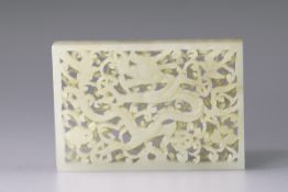 A White Jade Dragon Belt Plaque, Ming dynasty