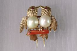 A Whimsical Diamond, Coral and Ruby Lovebird Clip Brooch, hallmarked 14 carat yellow gold, circa 196