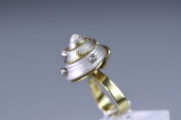 An Andrew Grima Pearl Shell Ring, dated 1979,size L, signed with Grima plaque,