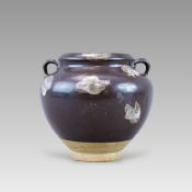 A Black-glazed Phosphatic-splashed Handled Jar, Tang Dynasty