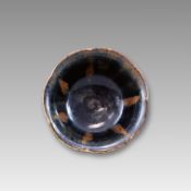 A black glazed flower shaped bowl, Probably Song Dynasty