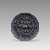 A Bronze Lion and Grapevine Mirror, Tang dynasty