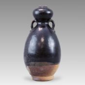 A Black-glazed Double Gourd Twin Handled Vase, Tang dynasty