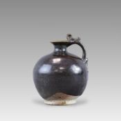 A Rare Black-glazed Globular Handled Jar, Tang dynasty