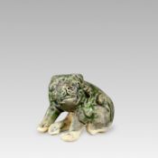 A Rare Green-glazed Figure of a Lion, Five dynasties