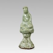 A Rare Longquan Celadon Figure of Guanyin, Ming dynasty