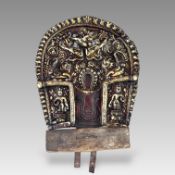 A Repousse Gilt Copper Mandorla, in high openwork relief,14/15th century