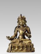A Rare Miniature Gilt Bronze Mahasiddha Figure, 18th century