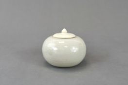 A White-glazed Globular Waterpot and Cover, Sui/Tang dynasty