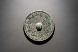 A Bronze Circular Mirror with the Inscription 